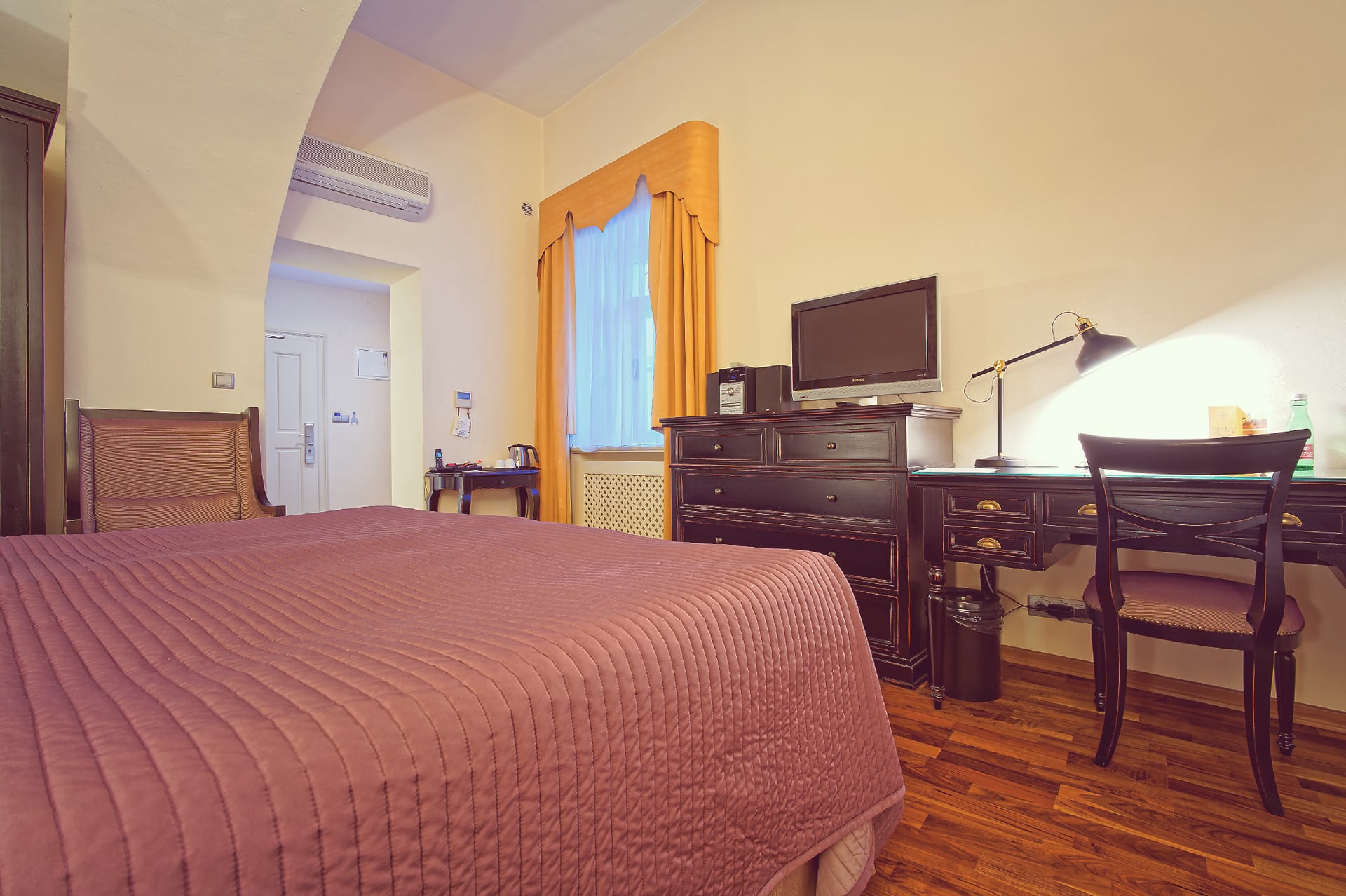 Bed with turndown amenities in a single room at SKARITZ Hotel Bratislava